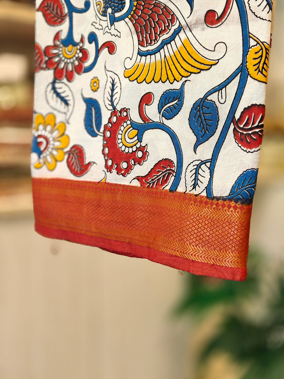 Cream Kalamkari Saree with Traditional Peacock Motifs