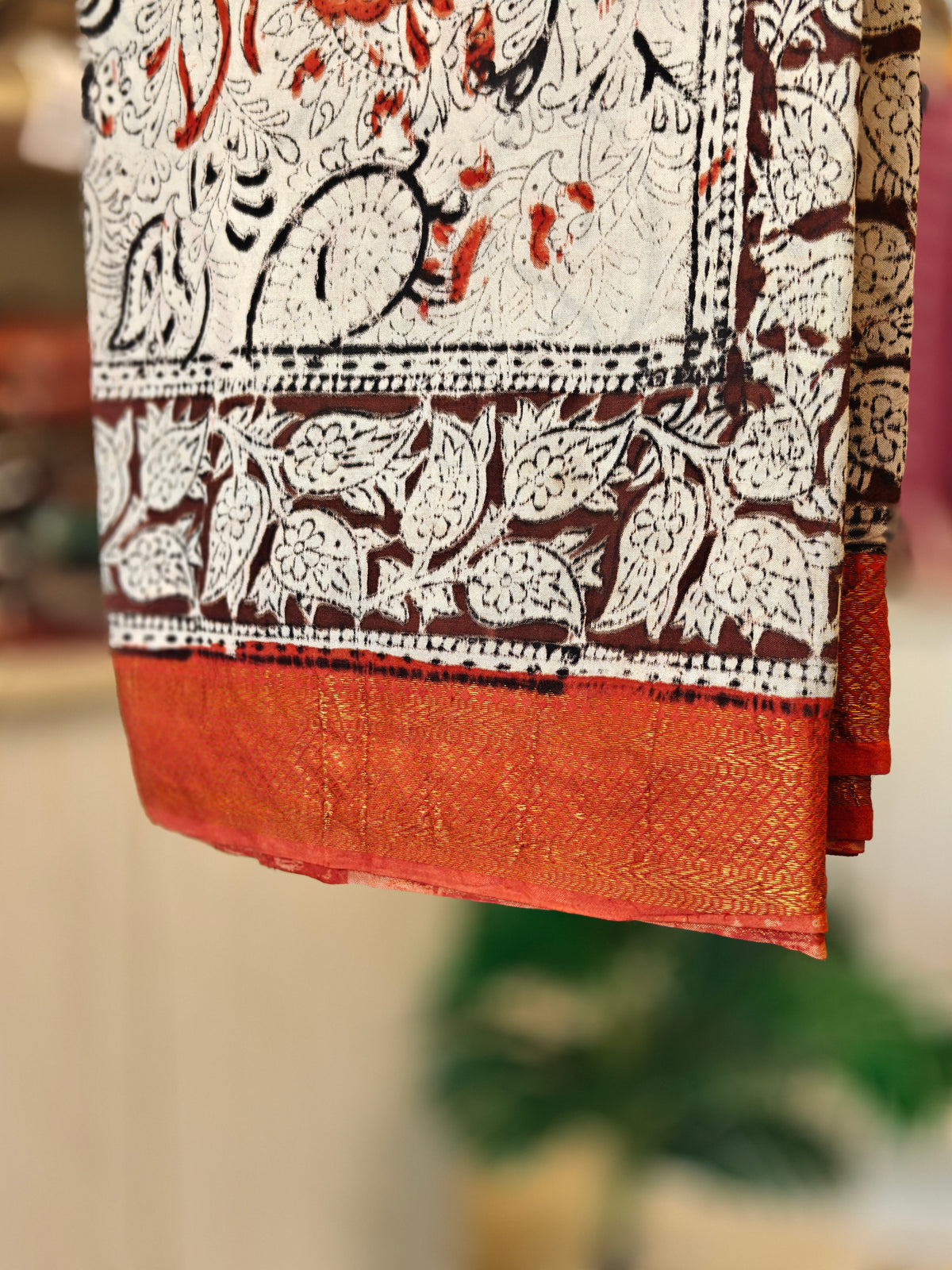 Cream Kalamkari Saree with Rust & Black Motifs